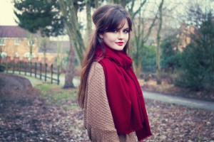 Out for a walk wearing rich red shawl and cosy cardigan